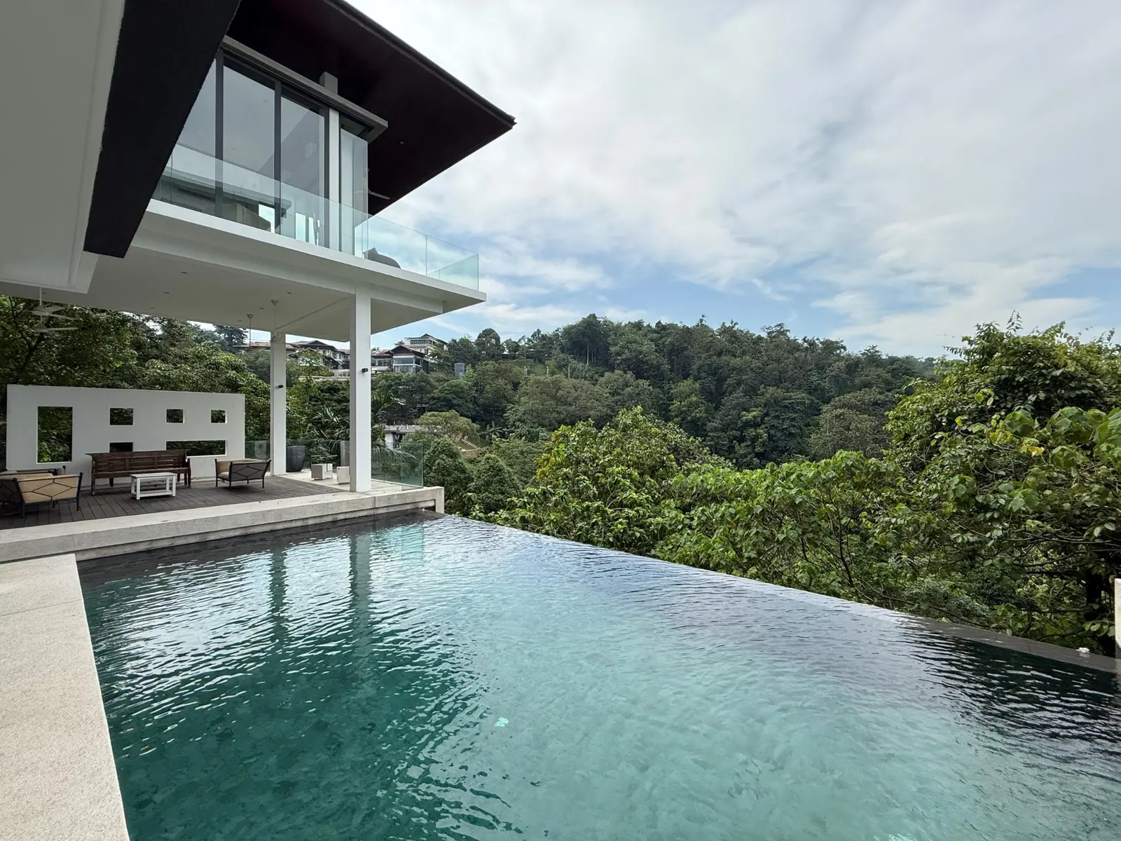 Private pool and exterior of the freehold Country Heights Damansara bungalow