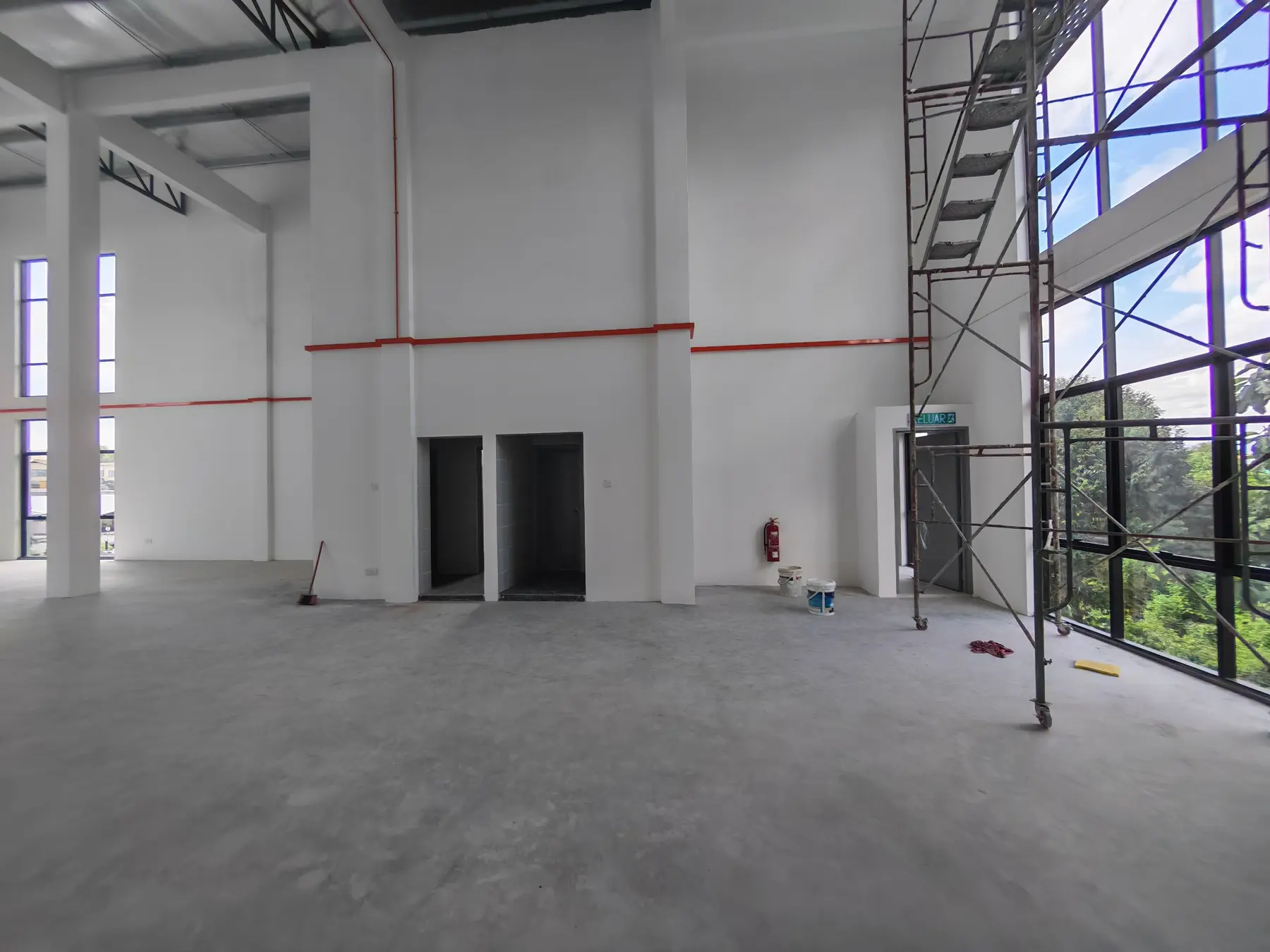 Side view of the high-ceiling commercial interior