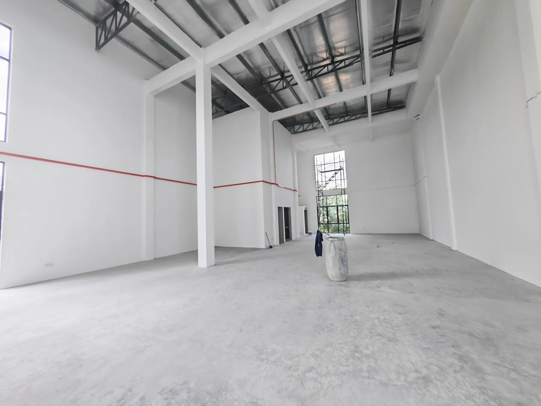 Rear view across the open commercial floor