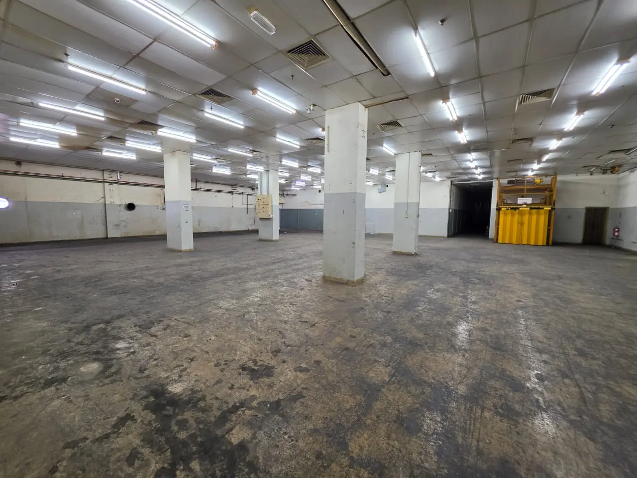 Large columned industrial floor inside the factory