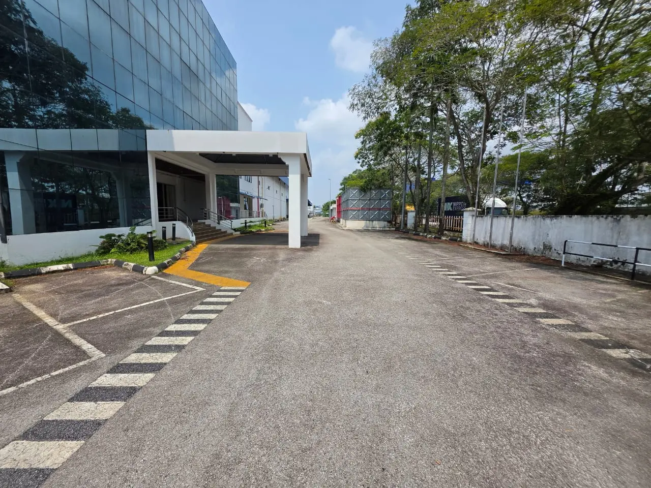 Driveway and office frontage within the industrial compound