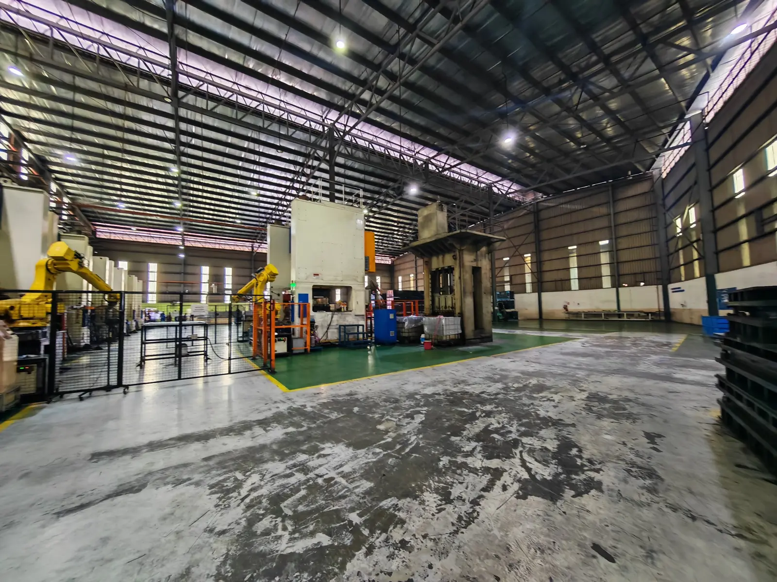 Wide production floor inside the factory