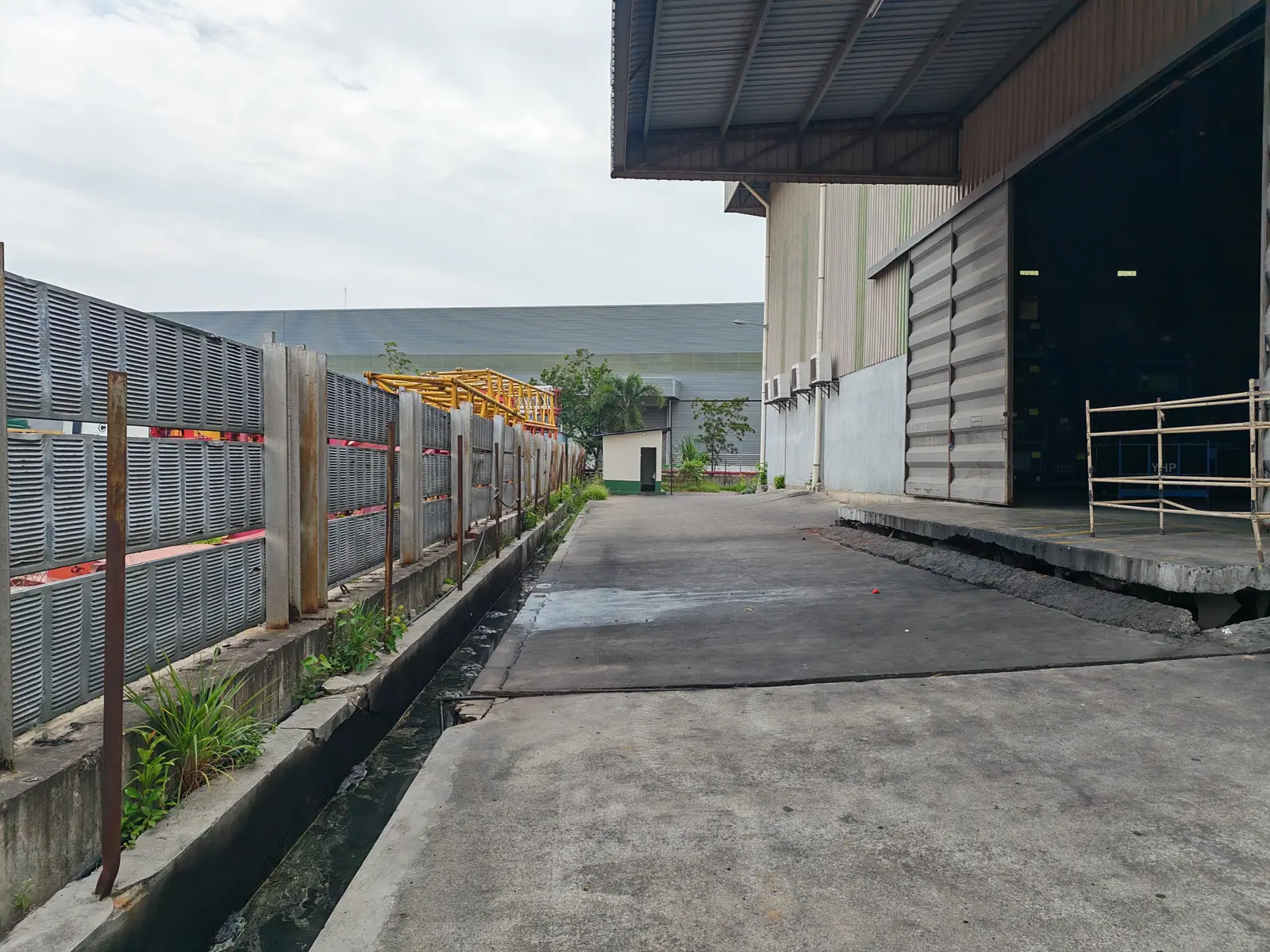 Side access road alongside the factory building